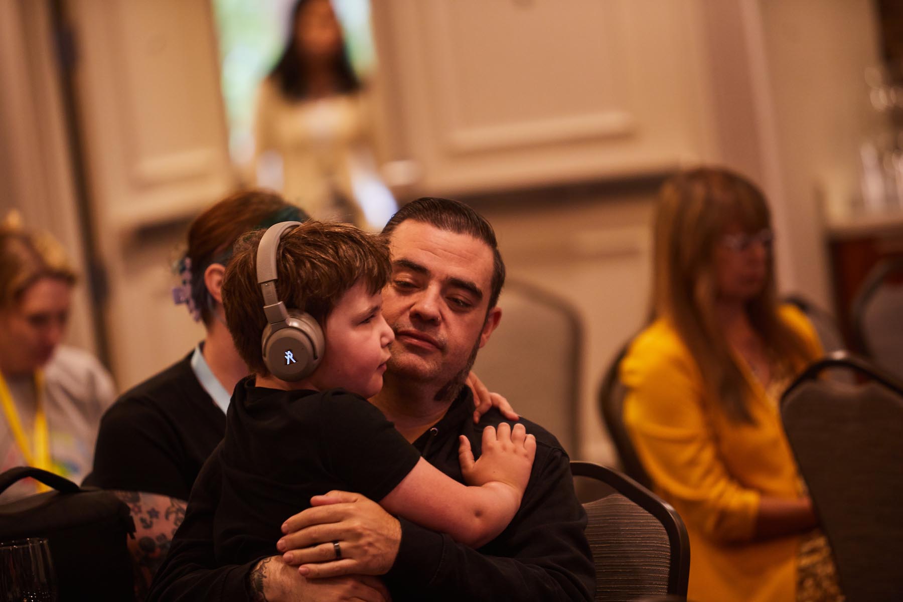 Father with child on shoulders